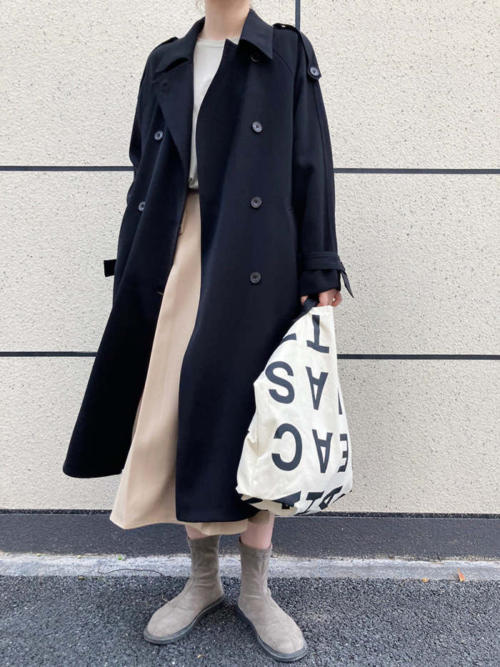 Drapey British style loose mid-length trench coat