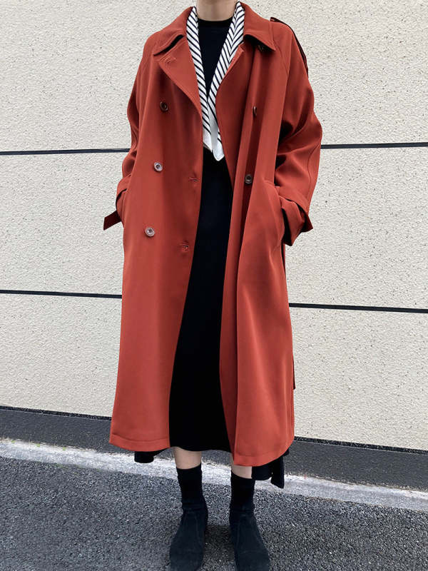 Drapey British style loose mid-length trench coat