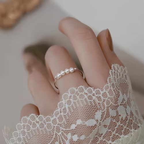 Elegant Adjustable Faux Pearl Ring - Simple Style, Copper Material with Imitation Pearl Inlay, No Plating, for Parties, All-Season Wear, Women's Fashion Accessory