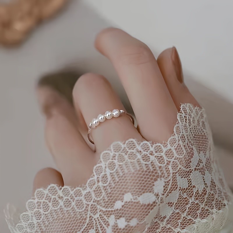 Elegant Adjustable Faux Pearl Ring - Simple Style, Copper Material with Imitation Pearl Inlay, No Plating, for Parties, All-Season Wear, Women's Fashion Accessory