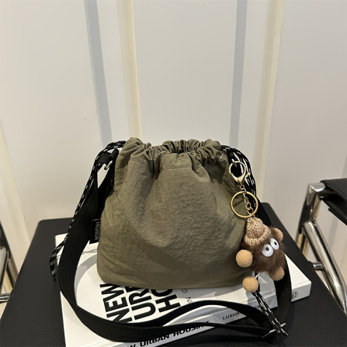 CCidea Cartoon Themed Canvas Crossbody Bag for Women - Solid Color, Hand Washable, Polyester Lined, Drawstring Closure, Cute Pendant Accessory, Lightweight Sports Single Shoulder Bag with Large Capacity