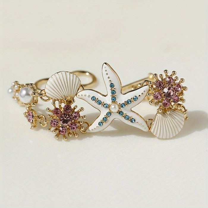 One gorgeous starfish pendant bracelet with shell details and sea coral beads suitable for beach daily wear and ocean vacation style