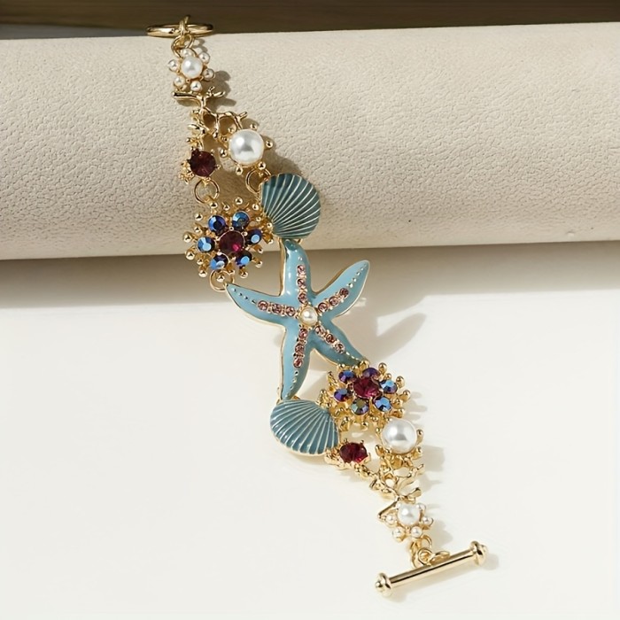 One gorgeous starfish pendant bracelet with shell details and sea coral beads suitable for beach daily wear and ocean vacation style