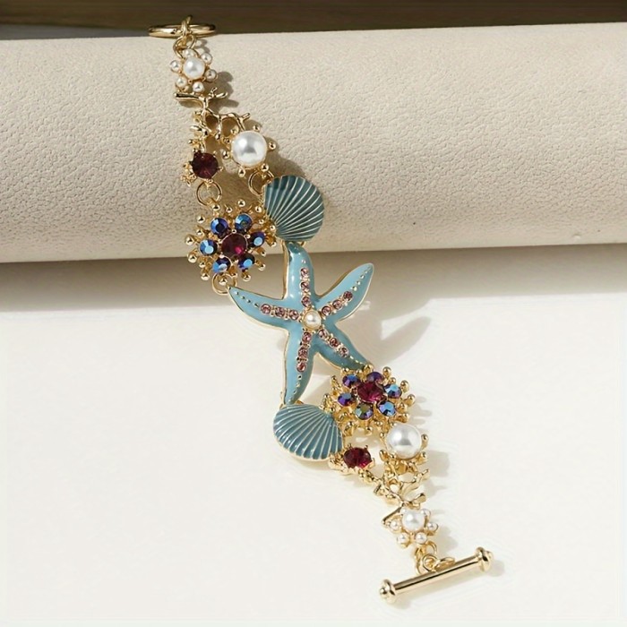 One gorgeous starfish pendant bracelet with shell details and sea coral beads suitable for beach daily wear and ocean vacation style