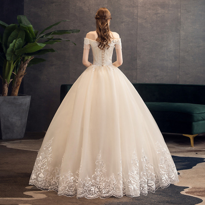 Word shoulder wedding dress new atmosphere Champagne color Qidisen French style gauze super fairy dream