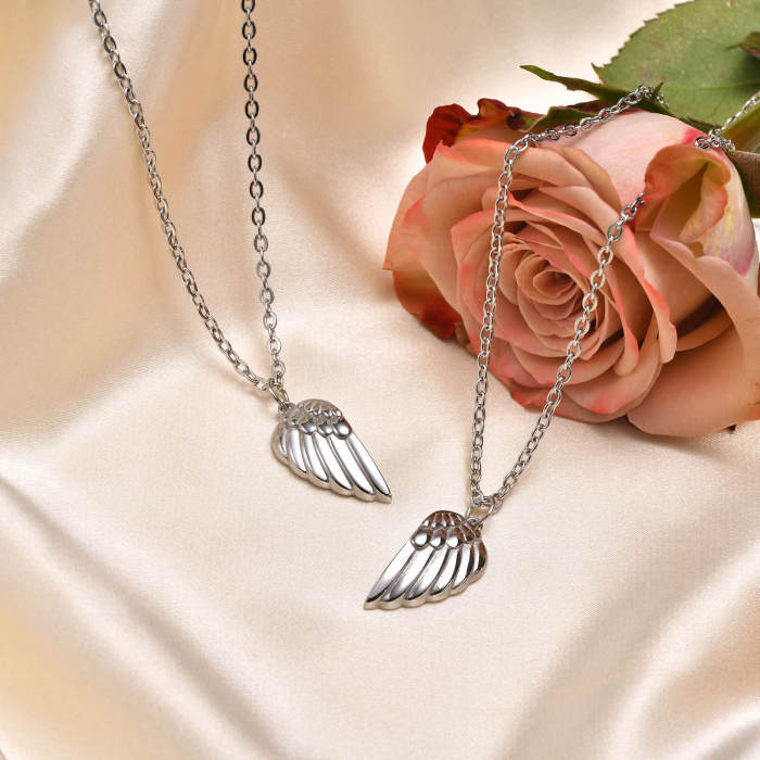 Wholesale Stainless Steel Wings Puzzle Couple Pendant