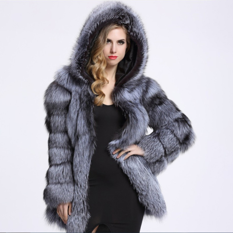 Winter fashionable and warm fur coat mid-length with a patchwork design, faux fox fur and faux fur coat