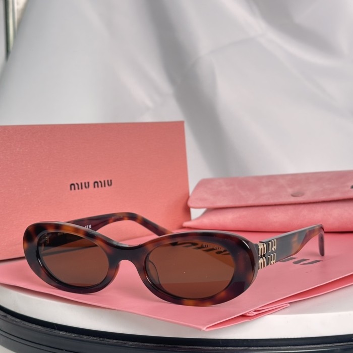 Miu Miu Sunglasses SMU06ZS SM021