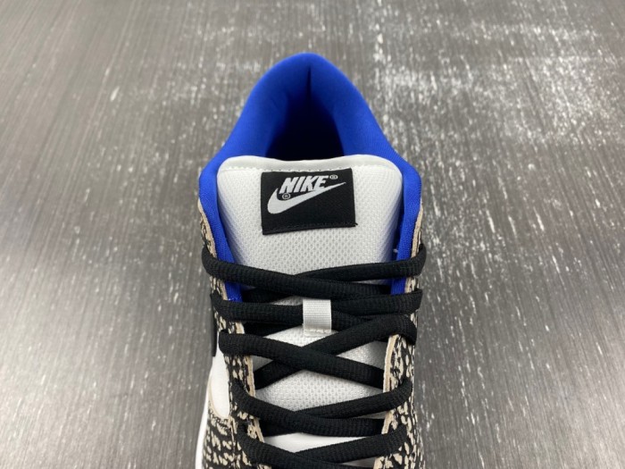 Supreme × Nike SB Dunk Low “White Cement 304292-001
