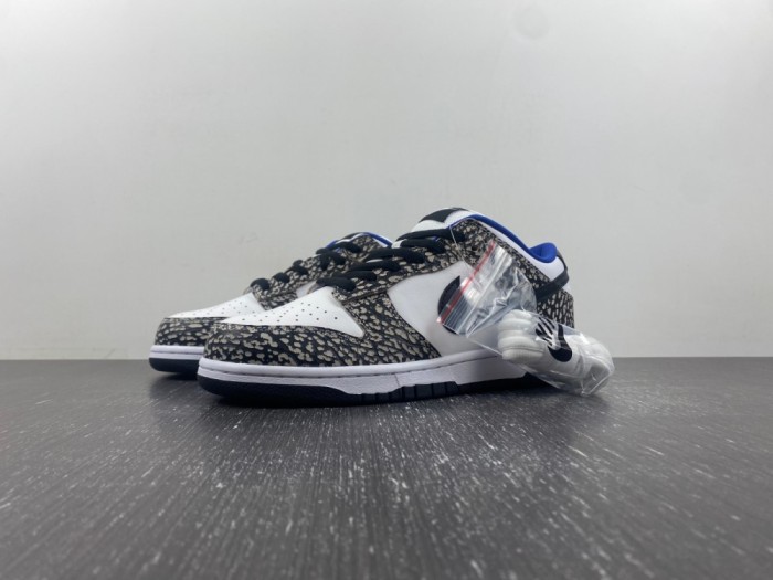 Supreme × Nike SB Dunk Low “White Cement 304292-001