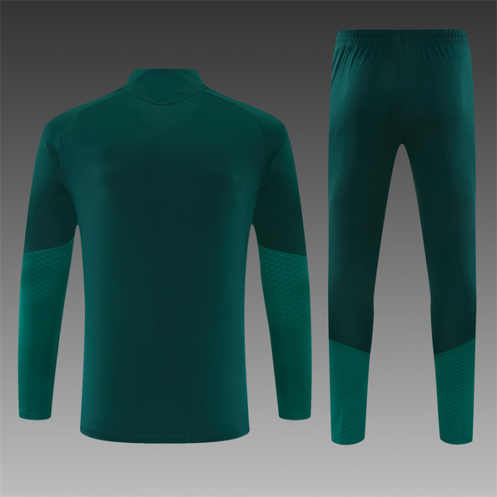 26/27 Real Madrid adult training uniform in dark green and rose red