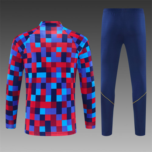26/27 Barcelona children's training uniform in red and blue