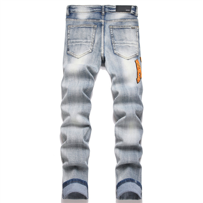 Amiri Orange Pattern Logo Embroidered Jeans