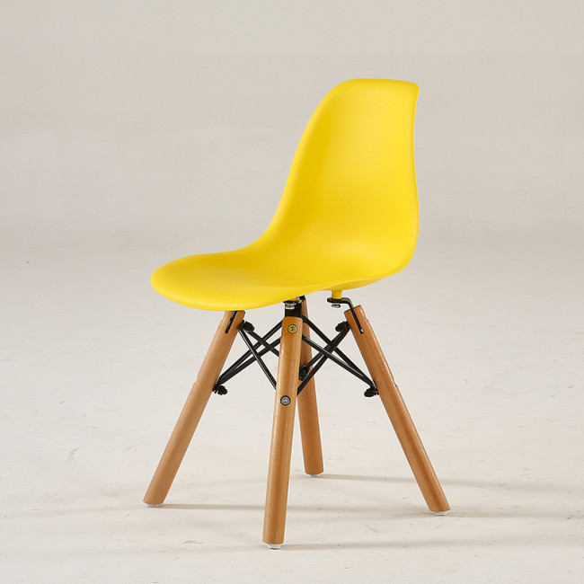 Yellow kids eames dsw chair