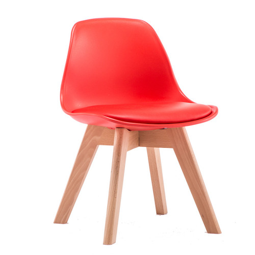 Red plastic kids chair with cushion
