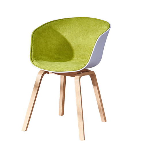 Nordic green fabric covered cafe dining armchair with wood legs