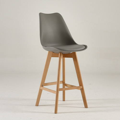 Dark grey plastic counter stool with footrest