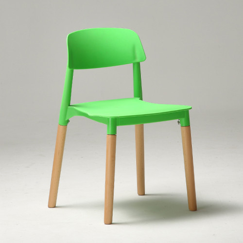 Modern designer green plastic chair with wood legs