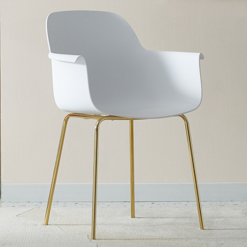 White plastic armchair with golden metal legs
