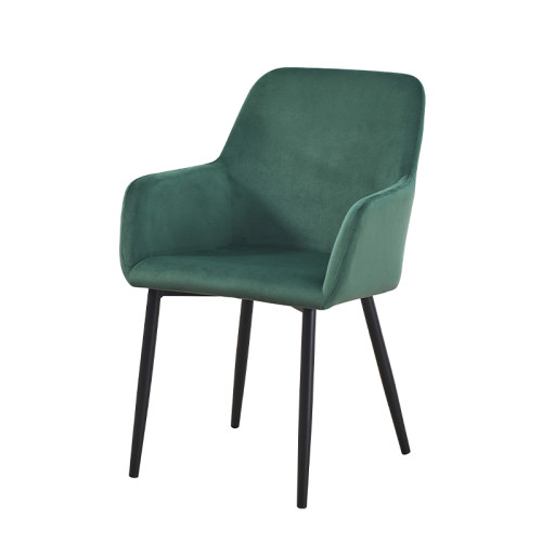 ​Luxurious green velvet dining armchair with sleek metal legs