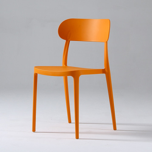 Orange stackable plastic chair armless
