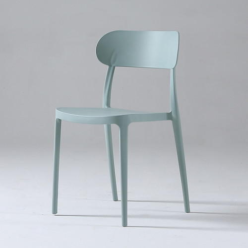 Light green stackable plastic chair armless