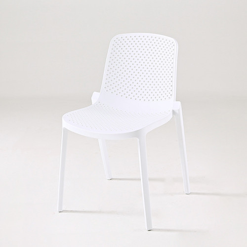 White plastic dining chair hollow out