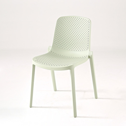 Light green plastic dining chair hollow out