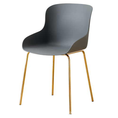 Sleek and modern plastic chair with its striking golden metal legs