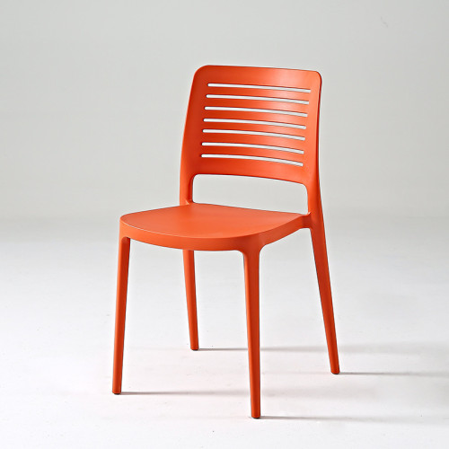 Hollow out curved back orange plastic chair stackable