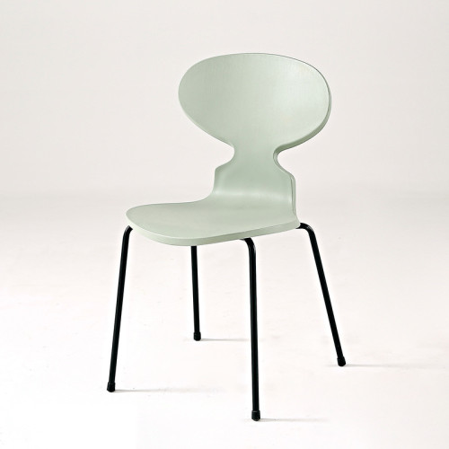 Light green plastic ant chair with black metal legs