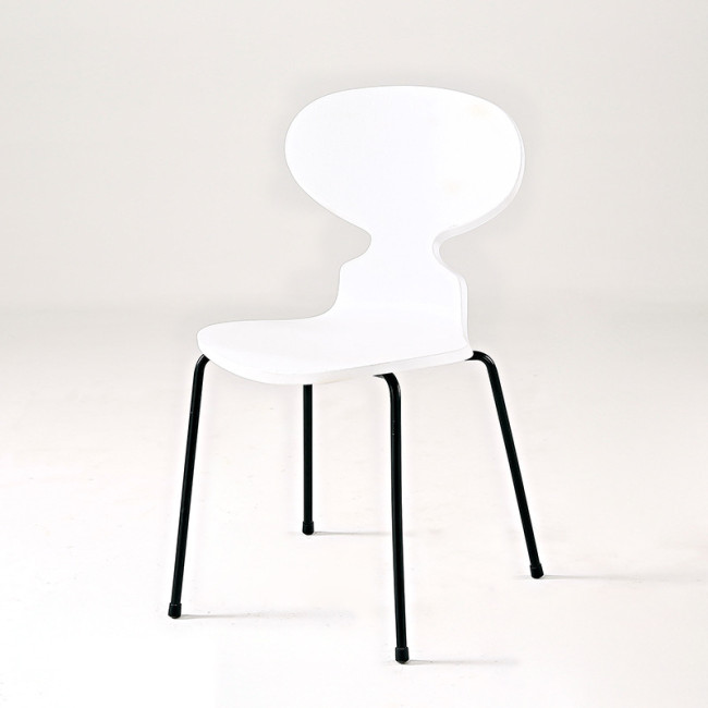 White plastic ant chair with black metal legs