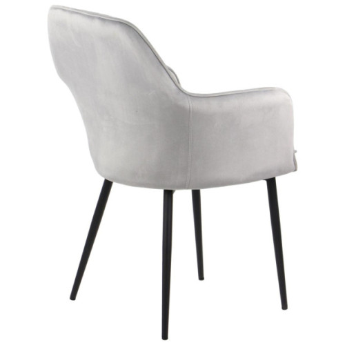 Luxurious and elegant dining chair with light grey padded cushions and velvet material