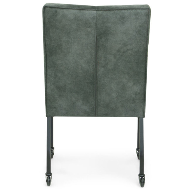 Mid century modern dark grey upholstered dining armchair on wheels