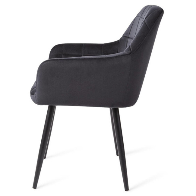 Dining Armchair upholstered in luxurious black velvet and boasting sturdy metal legs