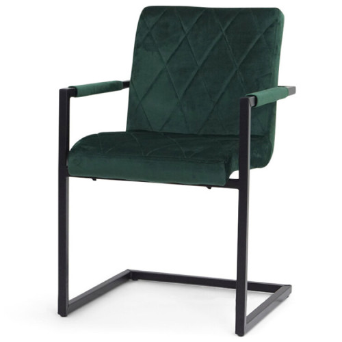 Dark green velvet armchair with metal frame