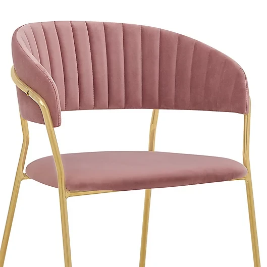 Exquisite pink velvet armchair with golden metal legs