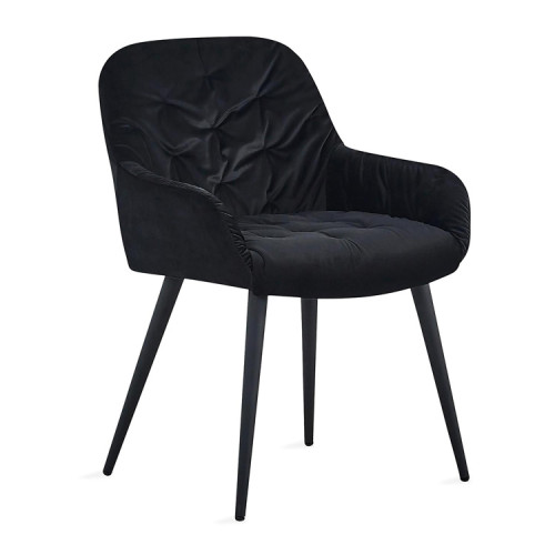 Black tufted velvet dining chair with stylish metal legs and comfortable armrests