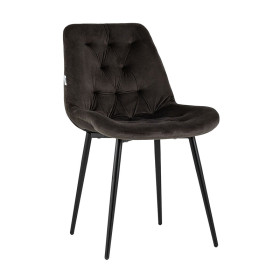 Coffee color velvet tufted dining chair with a curved back and sleek metal legs