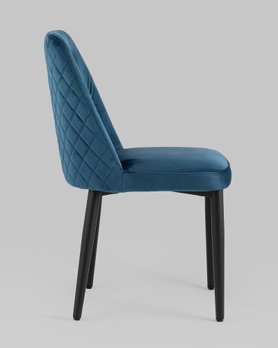 Luxurious and stylish dark blue tufted velvet dining chair with metal legs