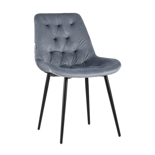 Elegant dark grey velvet tufted dining chair with a curved back and sleek metal legs