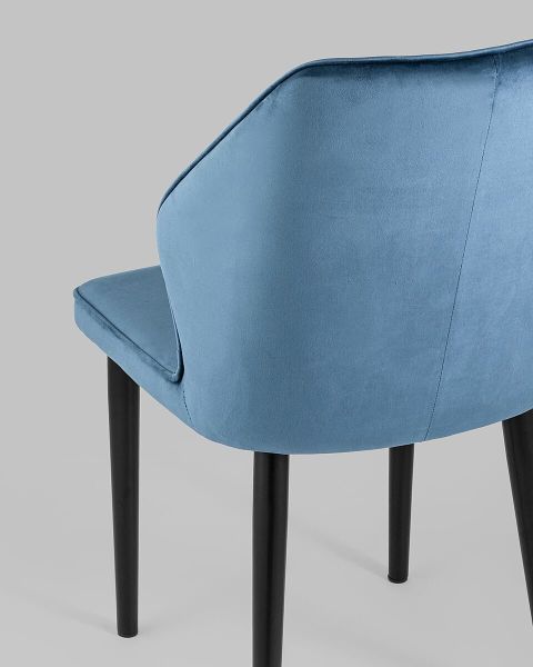 Dark blue velvet dining chair with elegant metal legs