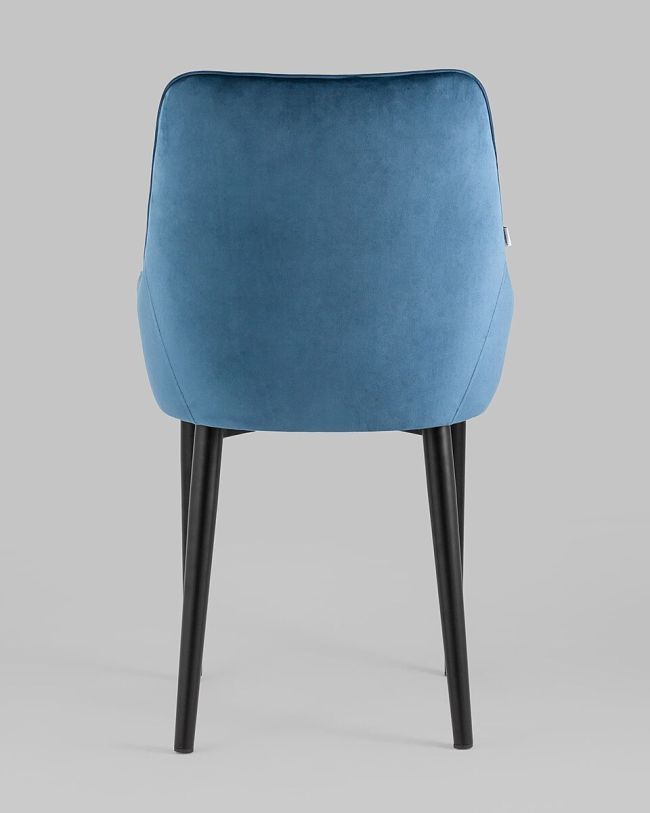 Curved back dark blue velvet dining chair with armrest