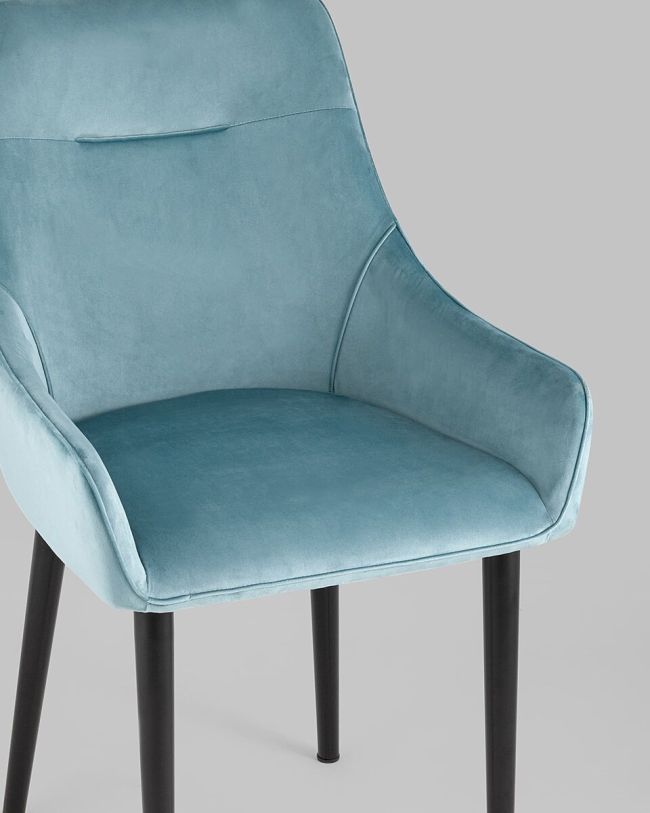 Curved back teal velvet dining chair with armrest
