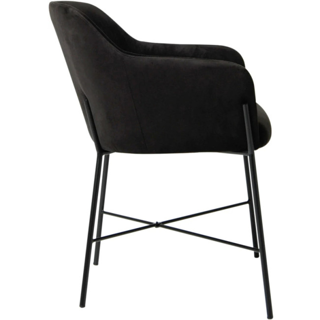 Luxurious and sophisticated black velvet dining armchair with sleek metal legs