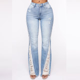 Womens Kiana Distressed Flare Jeans in Light Blue