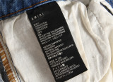 Men's  Starry Ripped Vintage Design Slim Fit Stretch Jeans with Embroidered Leather Patch