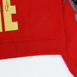 Bold hoodie featuring a futuristic robot head and  Godspeed  print. Back displays  OUT OF MANY, ONE  in distressed yellow text. Available in black and red with vintage wash. Perfect for edgy streetwear lovers.