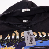Futuristic hoodie featuring a cybernetic figure holding a spark, with  Godspeed  print. Back displays a gradient  G  logo and  E Pluribus Unum.  Available in black and red with vintage wash. Perfect for bold streetwear style.