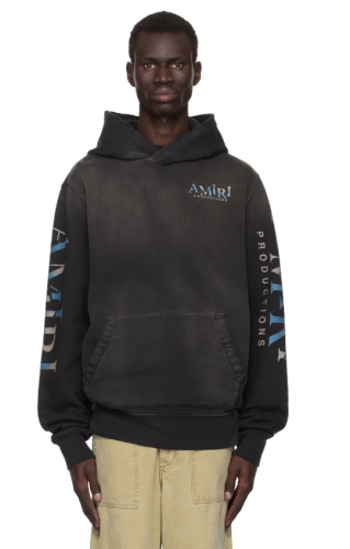 Edgy black hoodie with dramatic theater masks & rose print  bold sleeve logos — AMIRI Productions streetwear style premium cotton urban fashion statement